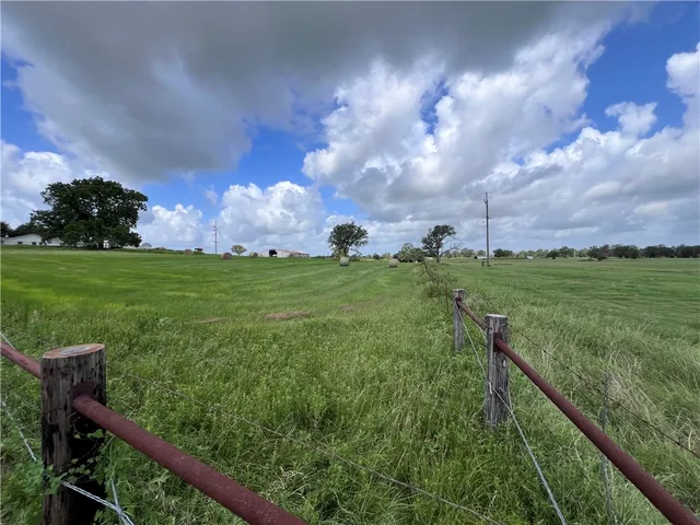 a view of a golf course with a garden