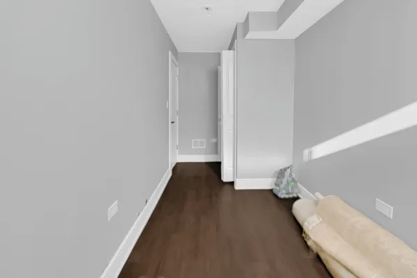 a view of entryway with wooden floor