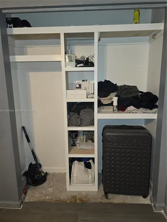 a kitchen with a stove and cabinets