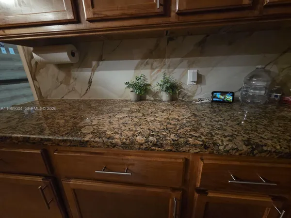 a close view of sink and microwave