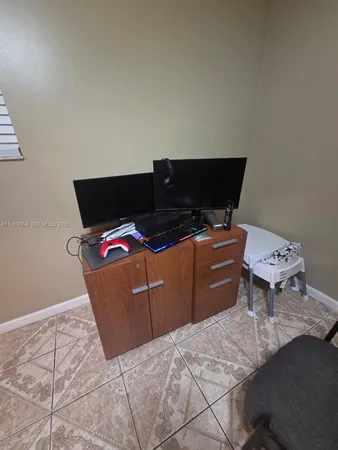 a room with a bed and furniture