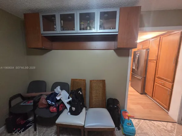 a view of workspace with wooden floor washer and dryer