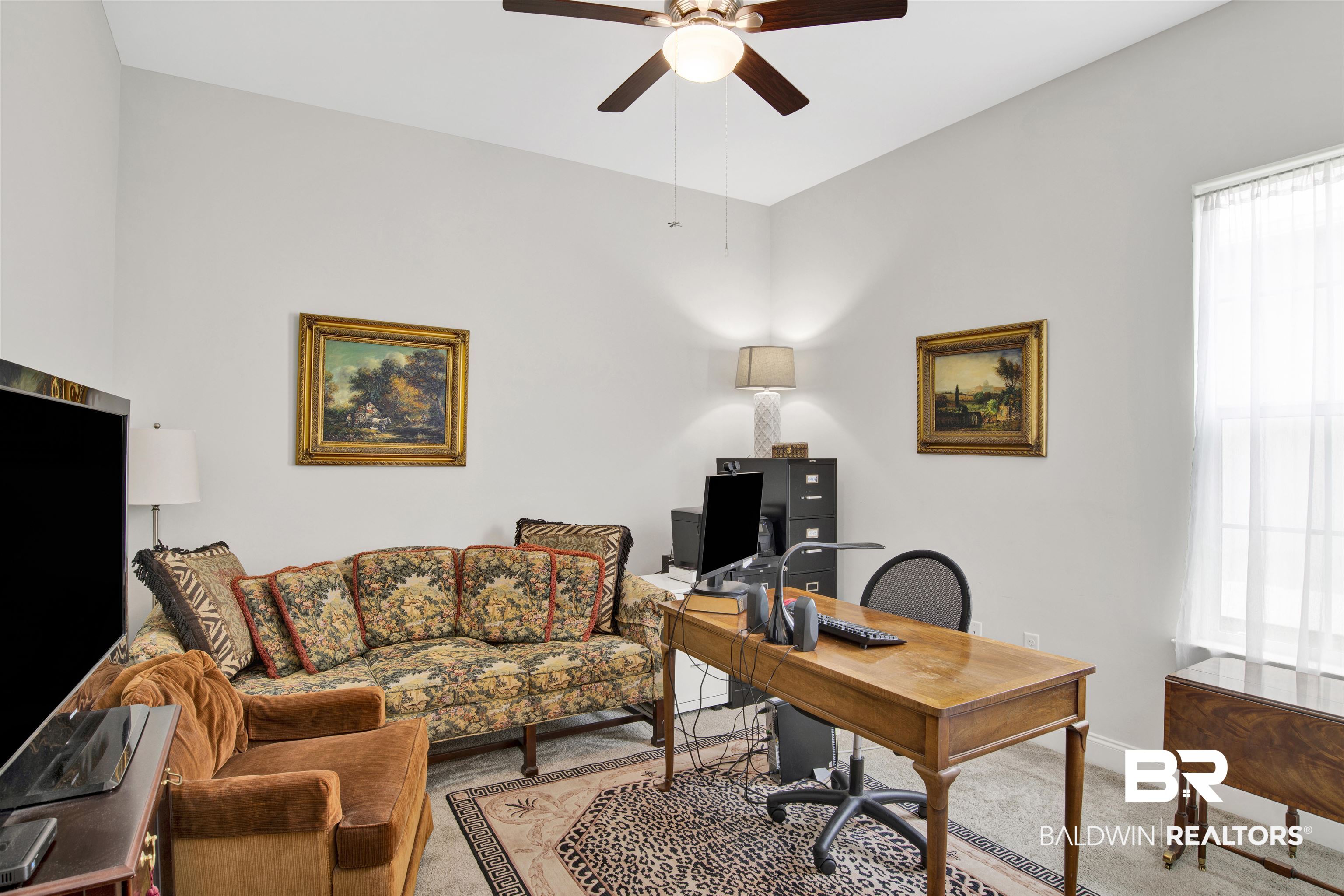 23893 Cypress Crossing Orange Beach, AL 36561 - Photo 9 of 22 Home office featuring a ceiling fan and light colored carpet