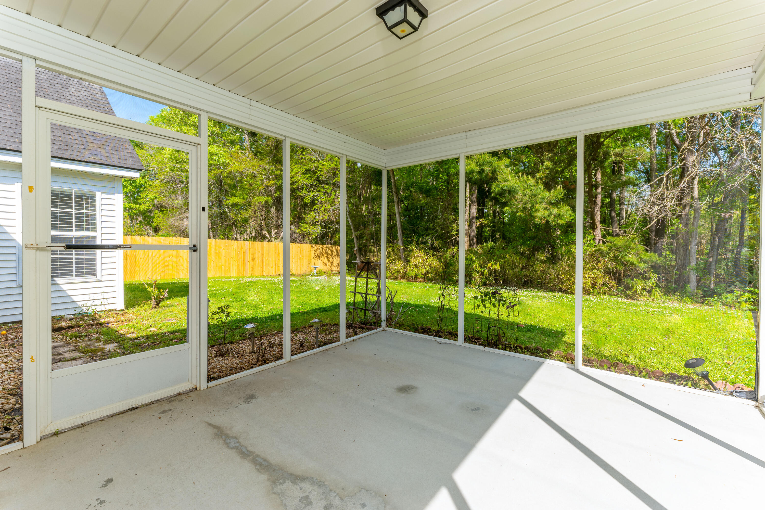 582 Carters Grove Road Charleston, SC 29414 - Photo 25 of 34 Covered and Screened Patio