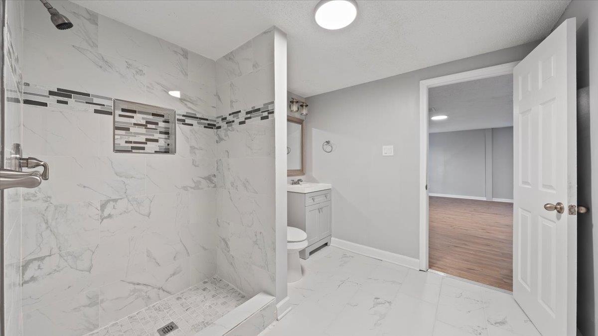 3817 Cazassa Road Memphis, TN 38116 - Photo 17 of 22 a bathroom with a shower