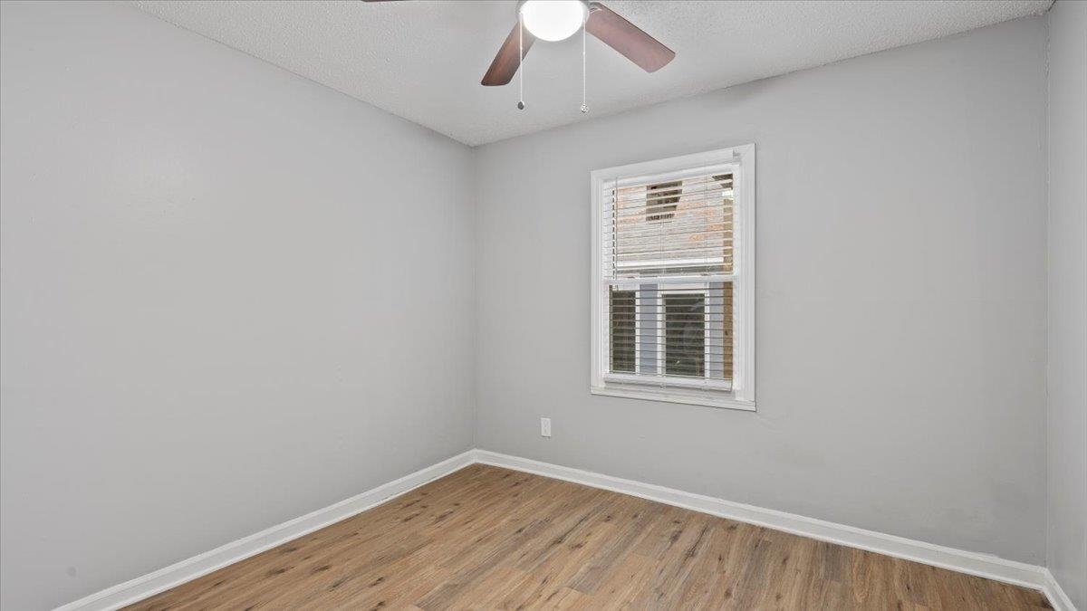 3817 Cazassa Road Memphis, TN 38116 - Photo 8 of 22 an empty room with a window