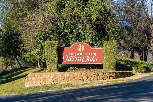 view of outdoor space with signage and flags