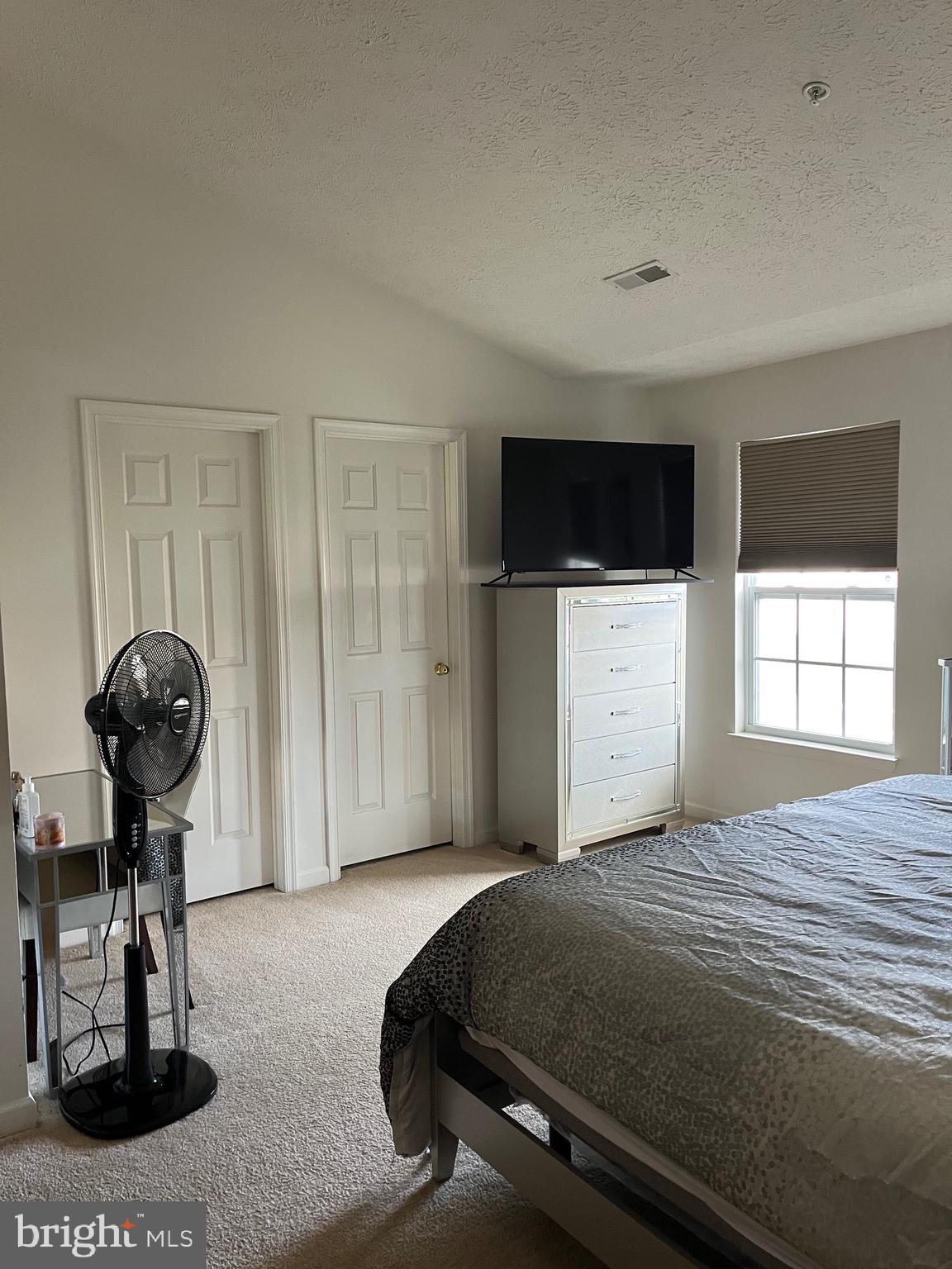 4817 Atlas Cedar Way Aberdeen, MD 21001 - Photo 18 of 21 a spacious bedroom with a bed and a window