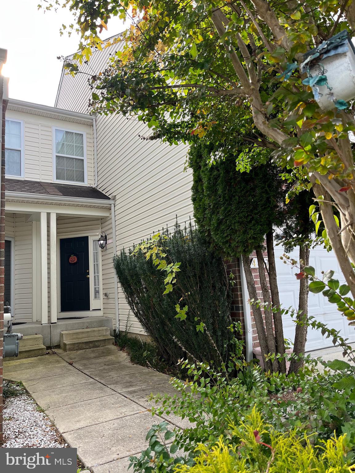 4817 Atlas Cedar Way Aberdeen, MD 21001 - Photo 4 of 21 a house with trees in front of it