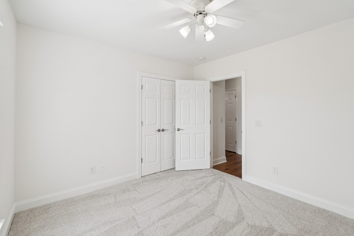 8552 Sawyer Brown Road Nashville, TN 37221 - Photo 12 of 25 a view of an empty room with a fan