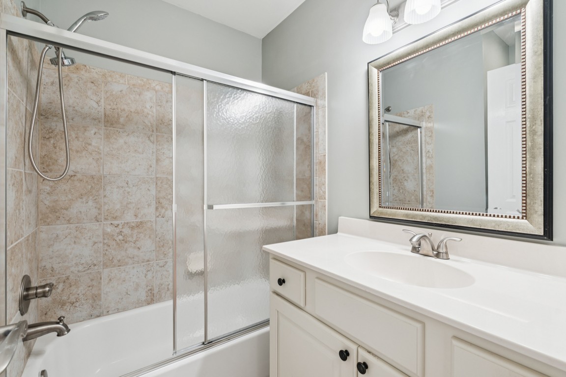 8552 Sawyer Brown Road Nashville, TN 37221 - Photo 13 of 25 a bathroom with a sink and a mirror