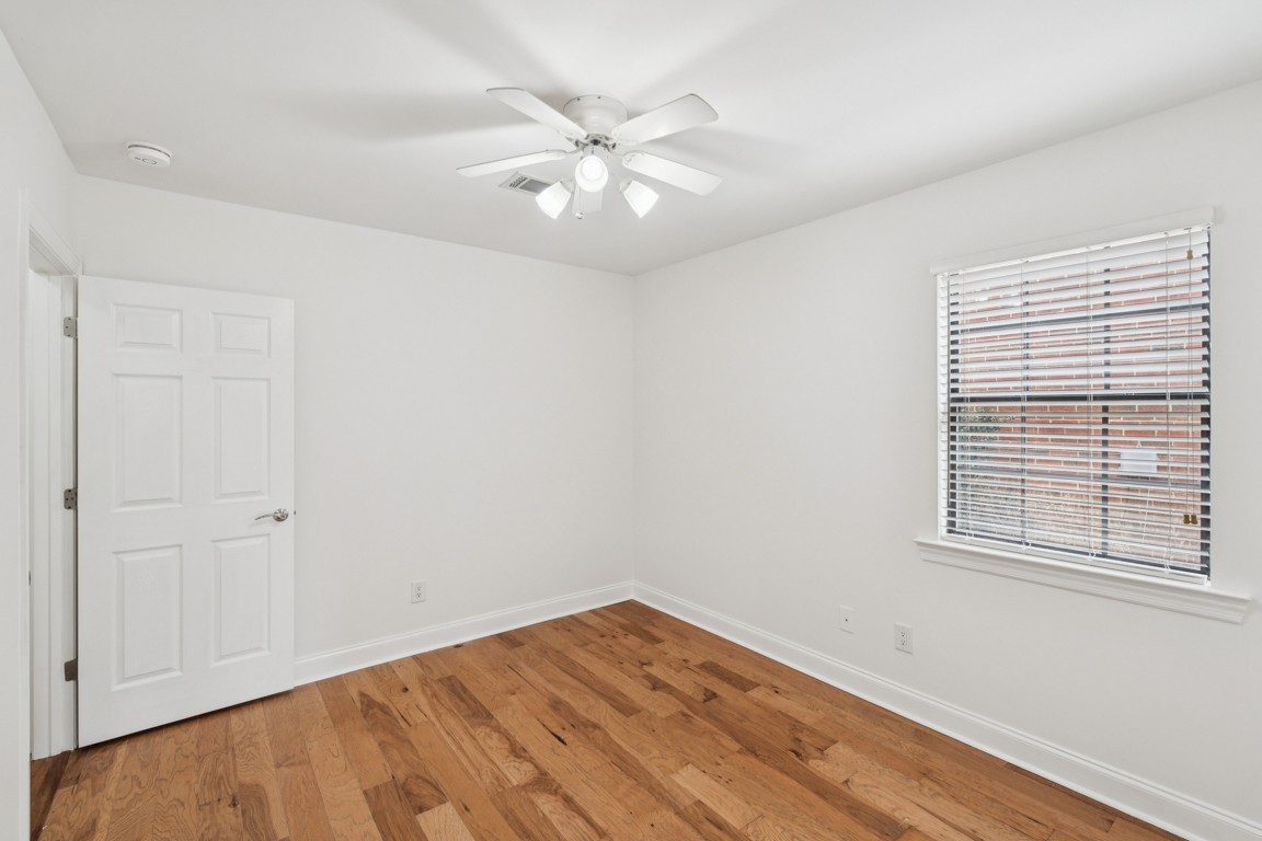 8552 Sawyer Brown Road Nashville, TN 37221 - Photo 14 of 25 wooden floor in an empty room with a window