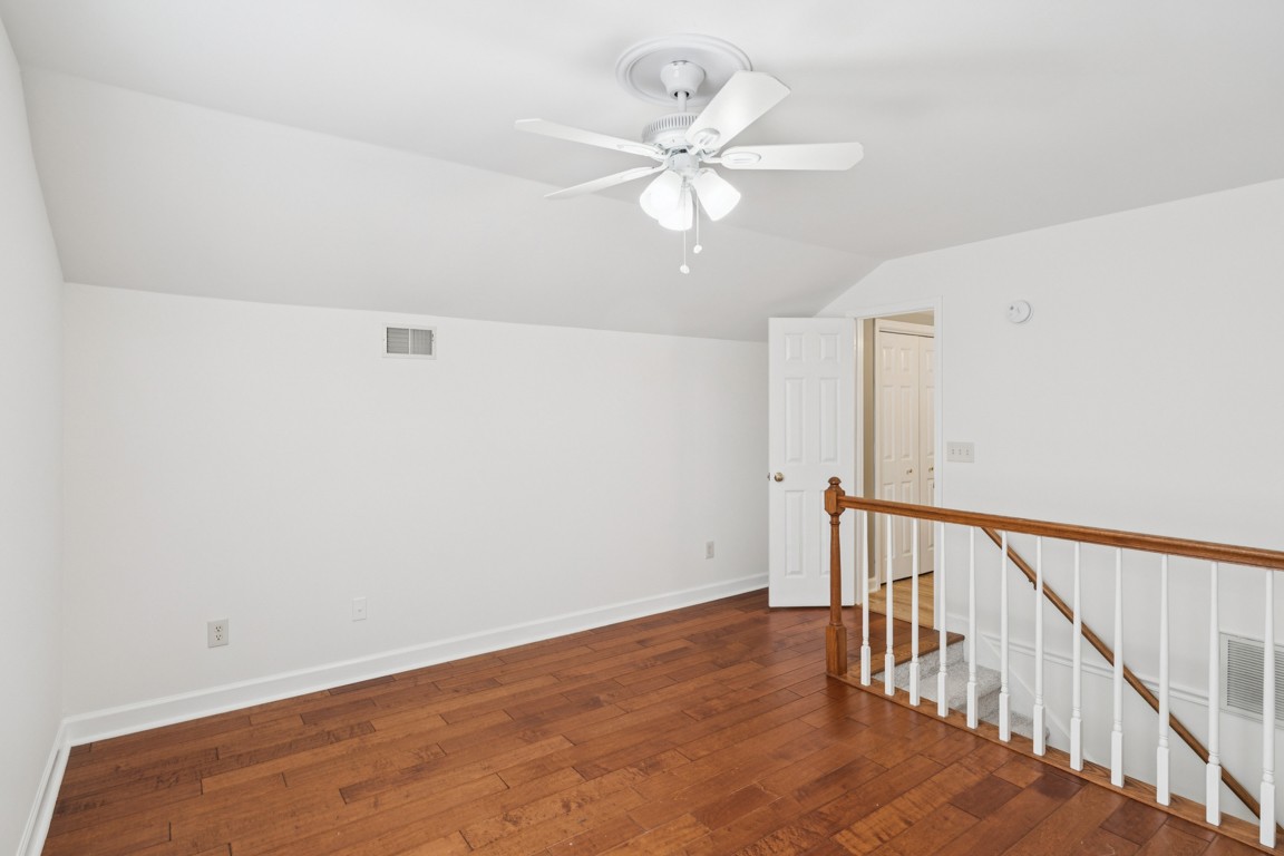 8552 Sawyer Brown Road Nashville, TN 37221 - Photo 21 of 25 a view of an empty room with wooden floor