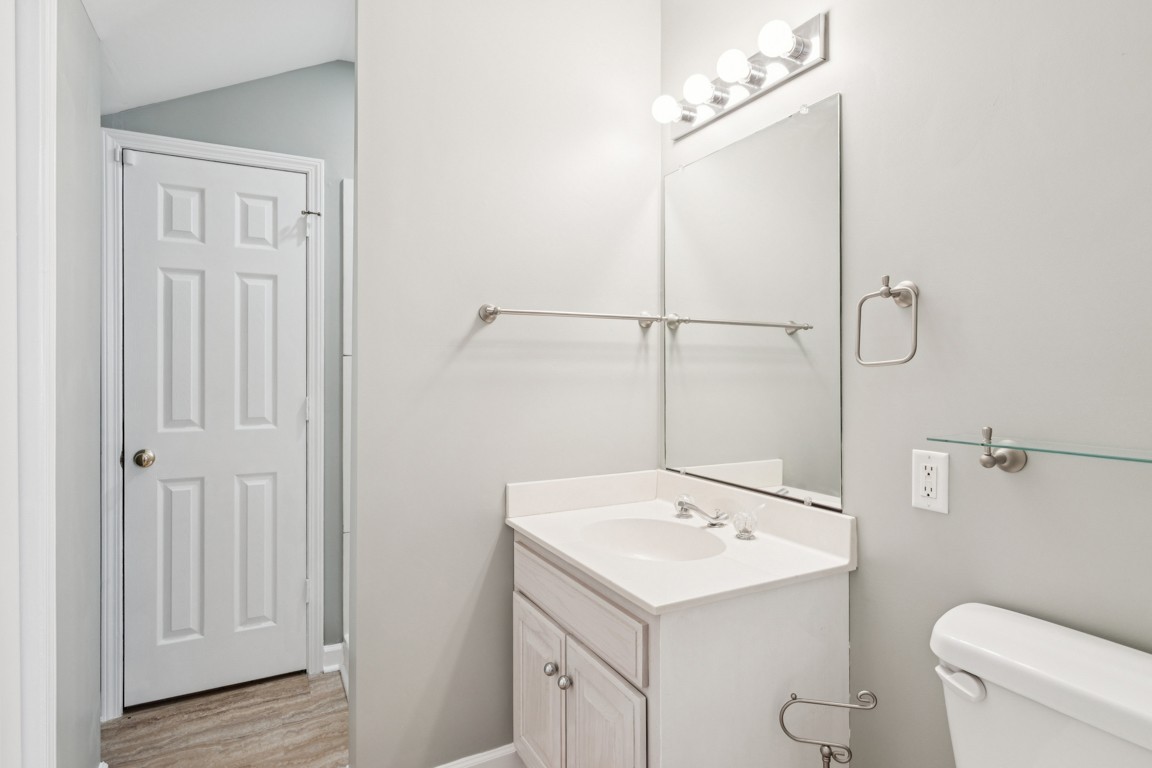 8552 Sawyer Brown Road Nashville, TN 37221 - Photo 22 of 25 a bathroom with a sink a toilet and shower