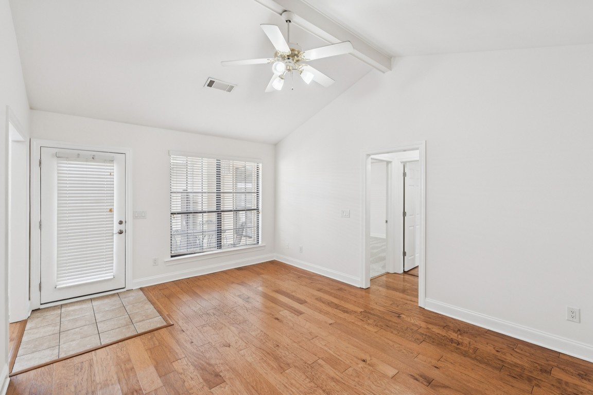 8552 Sawyer Brown Road Nashville, TN 37221 - Photo 3 of 25 wooden floor in an empty room with a window