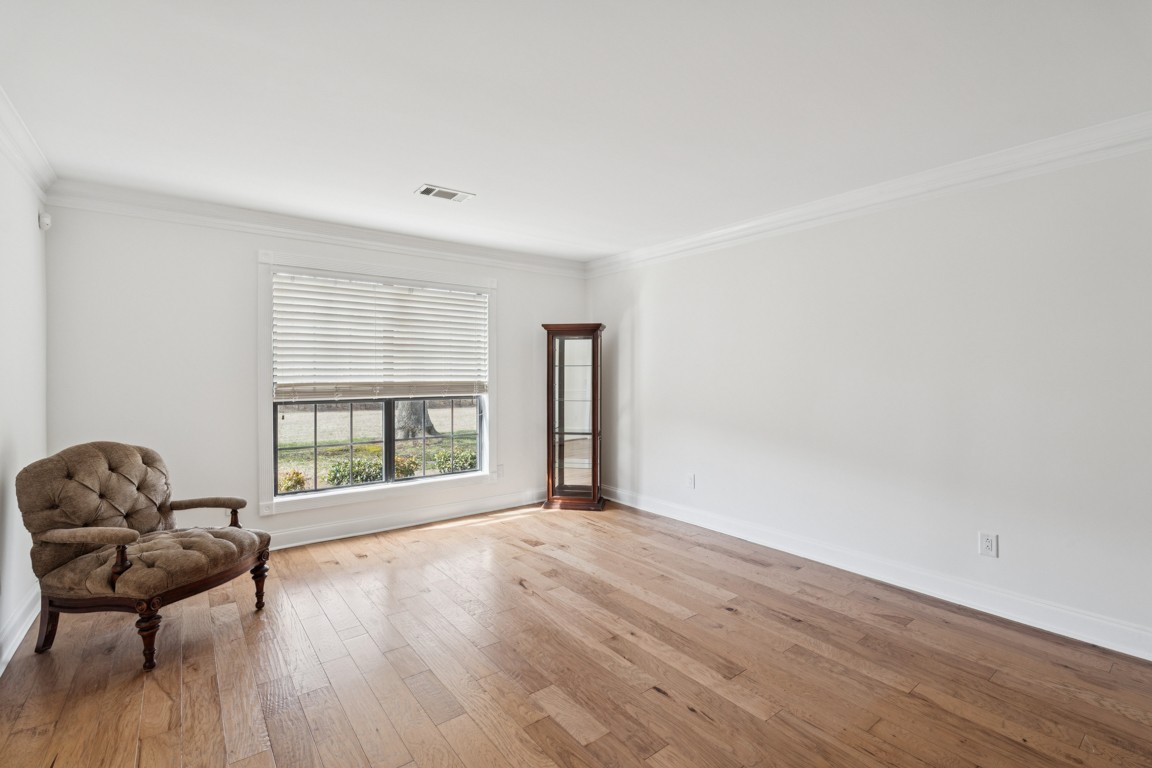 8552 Sawyer Brown Road Nashville, TN 37221 - Photo 5 of 25 a living room with a hardwood floor and a window