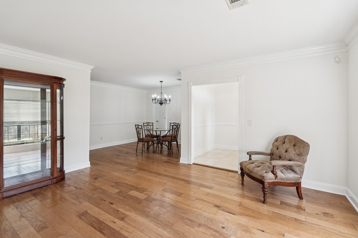 8552 Sawyer Brown Road Nashville, TN 37221 - Photo 6 of 25 a living room with furniture and a wooden floor