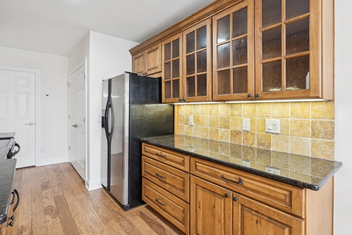 8552 Sawyer Brown Road Nashville, TN 37221 - Photo 8 of 25 a kitchen with stainless steel appliances granite countertop a refrigerator and a sink