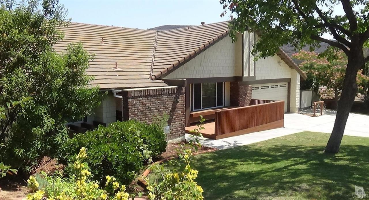 192 Wrangler Road Simi Valley, CA 93065 - Photo 1 of 40 front view of a house with yard