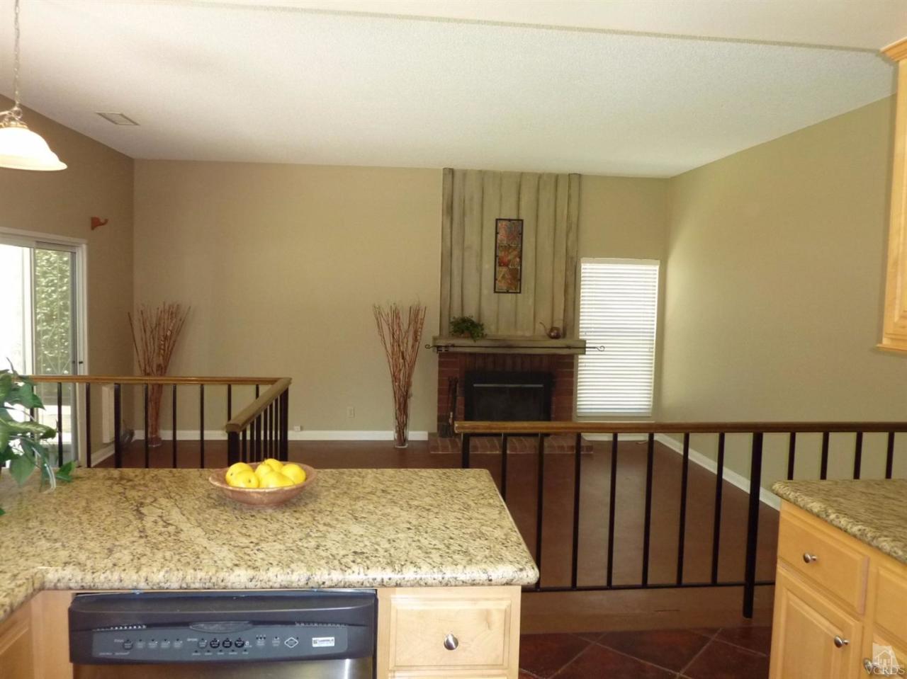 192 Wrangler Road Simi Valley, CA 93065 - Photo 11 of 40 a bathroom with a granite countertop sink and a mirror