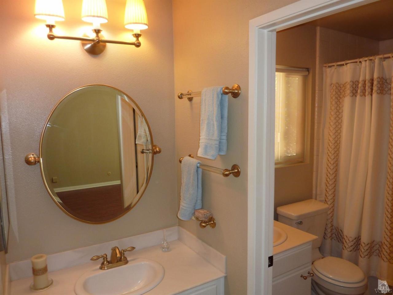 192 Wrangler Road Simi Valley, CA 93065 - Photo 14 of 40 a bathroom with a sink a toilet and shower