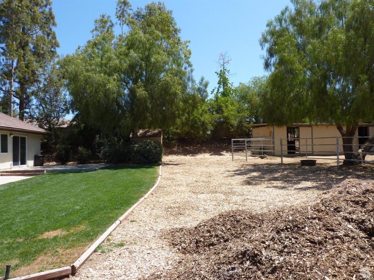 192 Wrangler Road Simi Valley, CA 93065 - Photo 31 of 40 a view of a yard with plants and a trees
