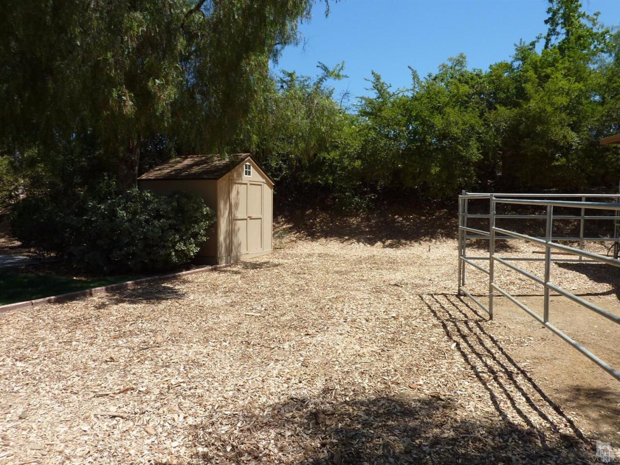 192 Wrangler Road Simi Valley, CA 93065 - Photo 32 of 40 a backyard of a house with lots of green space