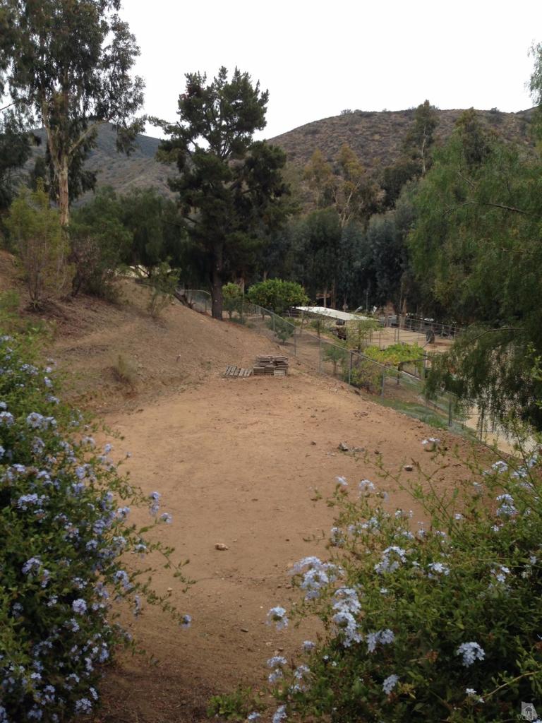 192 Wrangler Road Simi Valley, CA 93065 - Photo 36 of 40 a view of a dry yard with trees