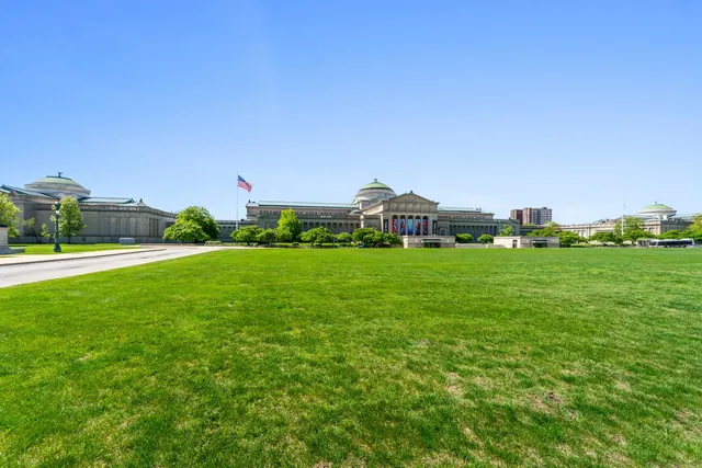 a view of a garden with houses