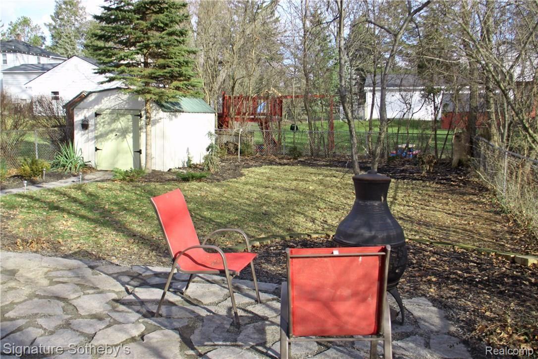130 North Helen Avenue Rochester, MI 48307 - Photo 31 of 34 Backyard, nice professional landscaping, hot tub on deck, great for entertaining