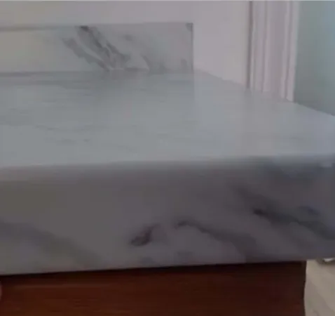 a bathroom with a bathtub and a sink