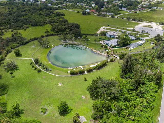 a view of a lake with a big yard