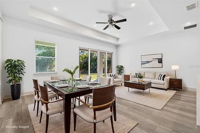 a kitchen with stainless steel appliances a refrigerator sink and microwave