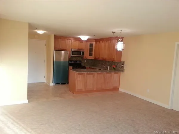a view of a kitchen with a sink