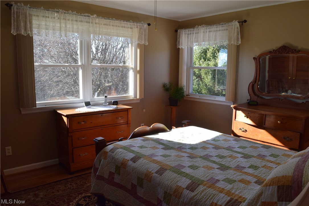 65578 Mathews Road Cambridge, OH 43725 - Photo 13 of 40 Bedroom with dark hardwood / wood-style floors