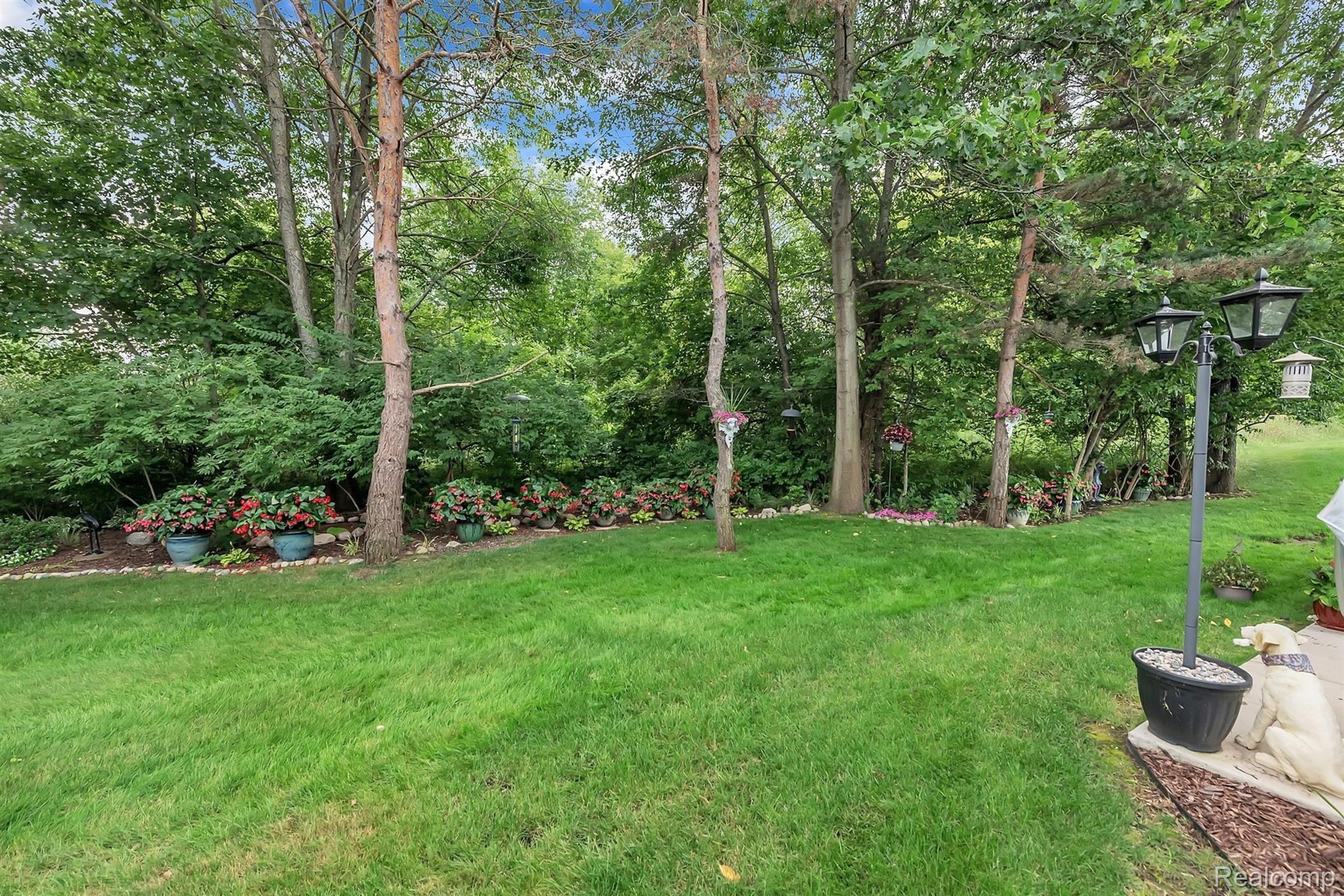 147 Sedum Road Howell, MI 48843 - Photo 28 of 34 Treelined Backyard Offers Privacy
