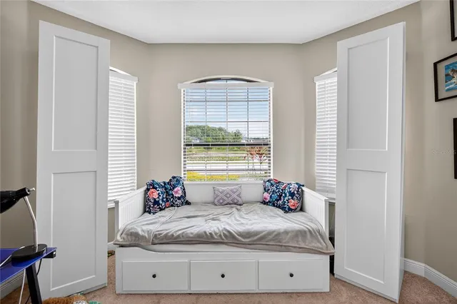 a living room with furniture and window