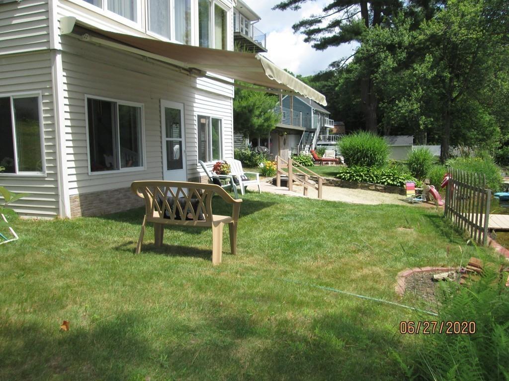 44 Ridge Trail Douglas, MA 01516 - Photo 14 of 22 a view of a house with backyard and sitting area
