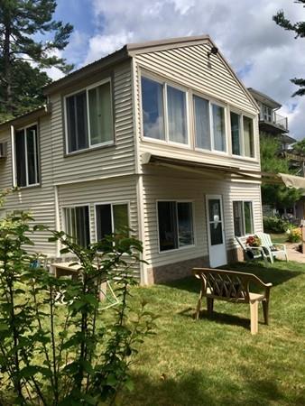 44 Ridge Trail Douglas, MA 01516 - Photo 15 of 22 a front view of a house with garden