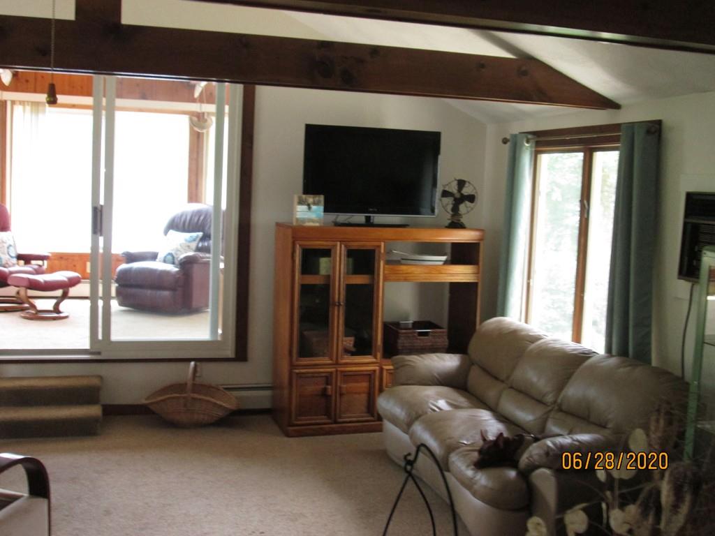 44 Ridge Trail Douglas, MA 01516 - Photo 21 of 22 a living room with furniture and a flat screen tv