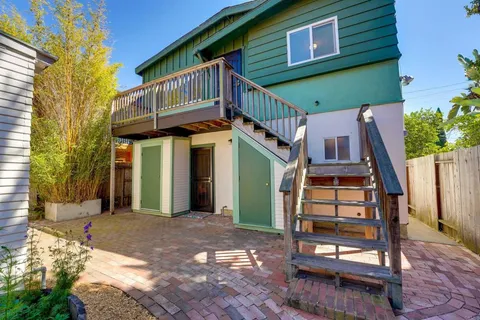 a view of a house with wooden walls