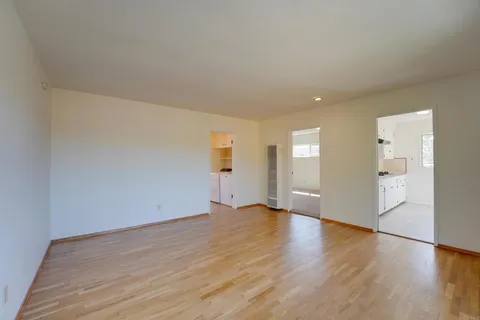 a kitchen with stainless steel appliances a stove a sink and a refrigerator