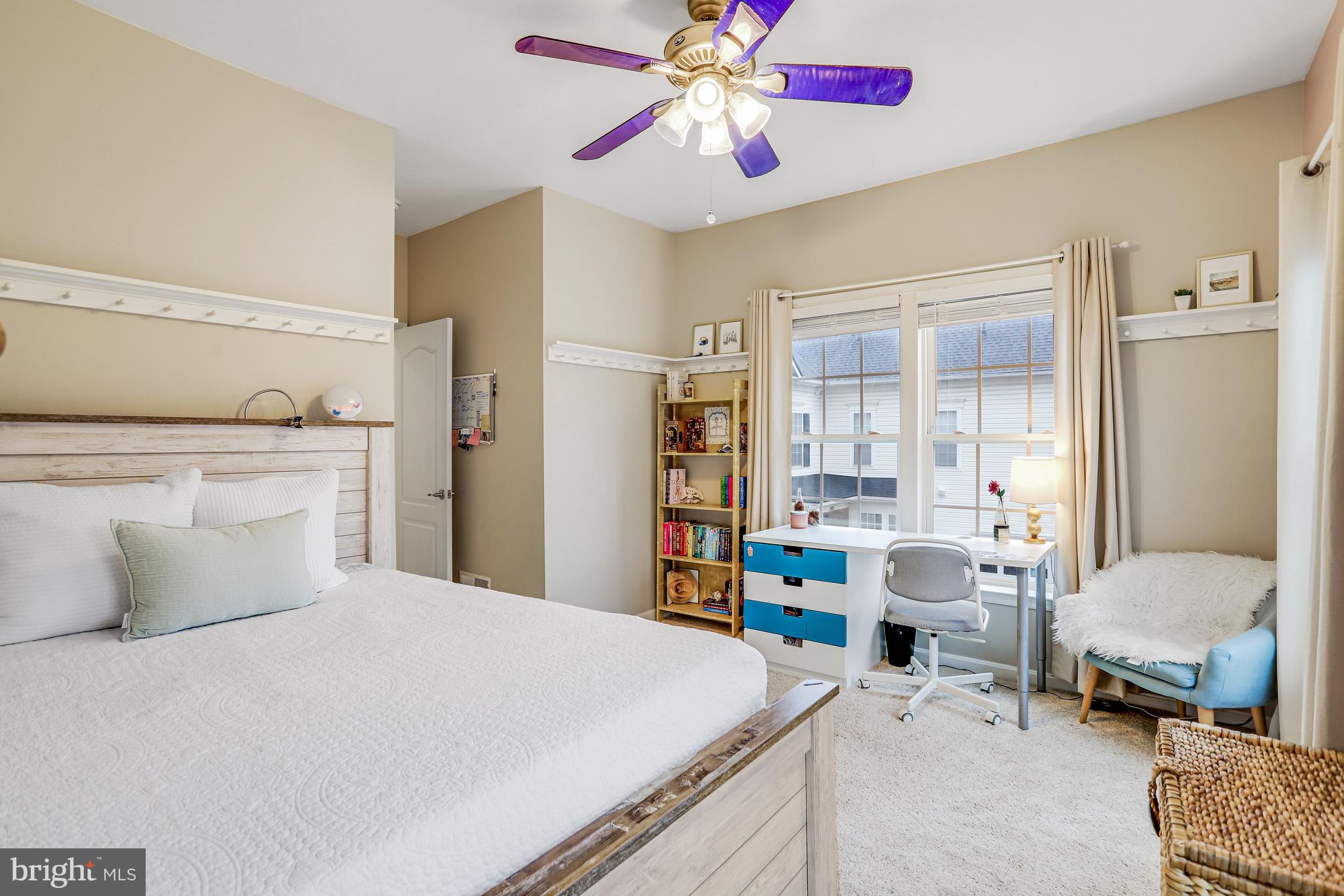 21625 Merion Street Ashburn, VA 20147 - Photo 15 of 80 a bedroom with a bed and furniture