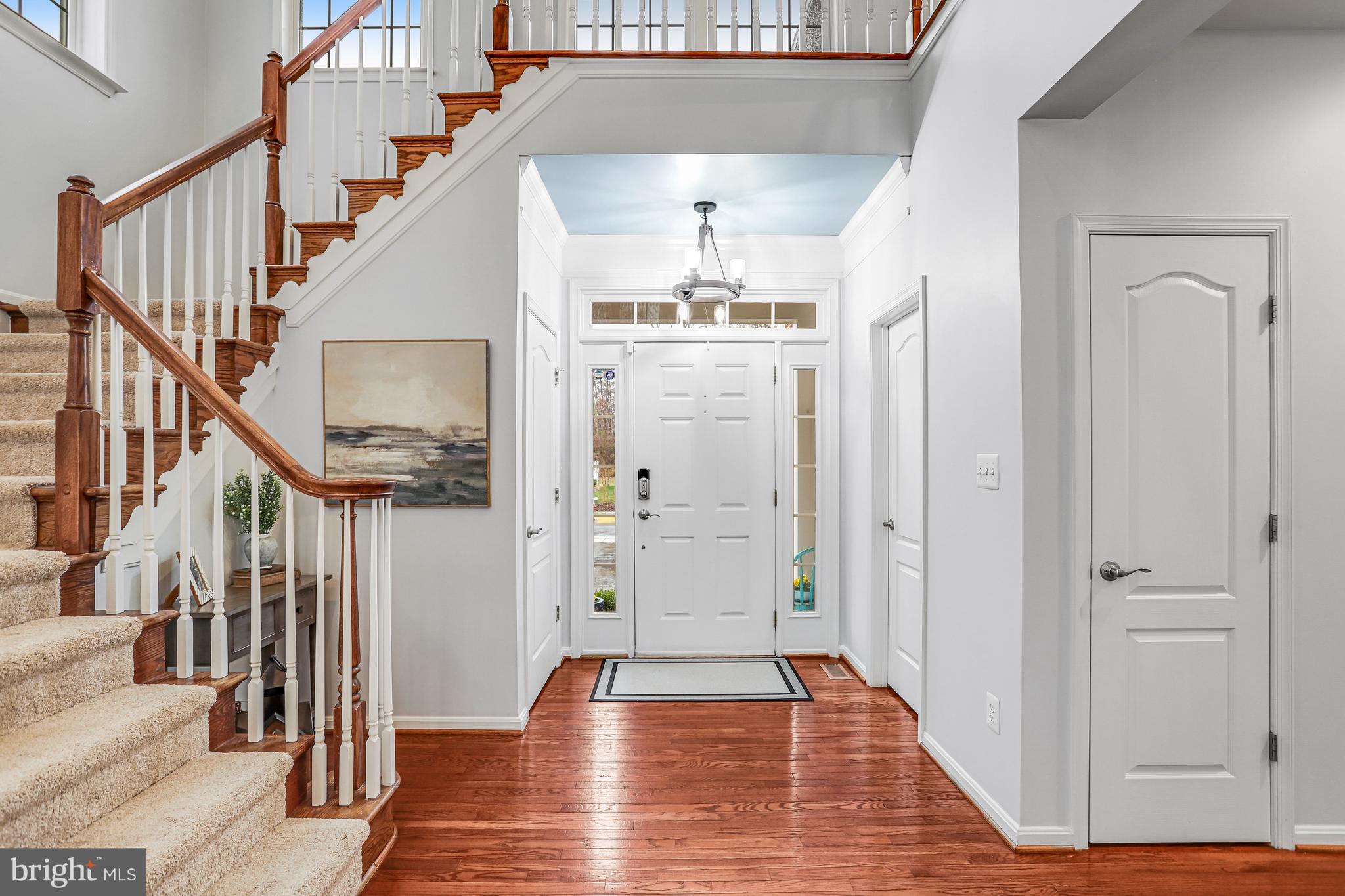 21625 Merion Street Ashburn, VA 20147 - Photo 27 of 80 a view of entryway and hall with wooden floor