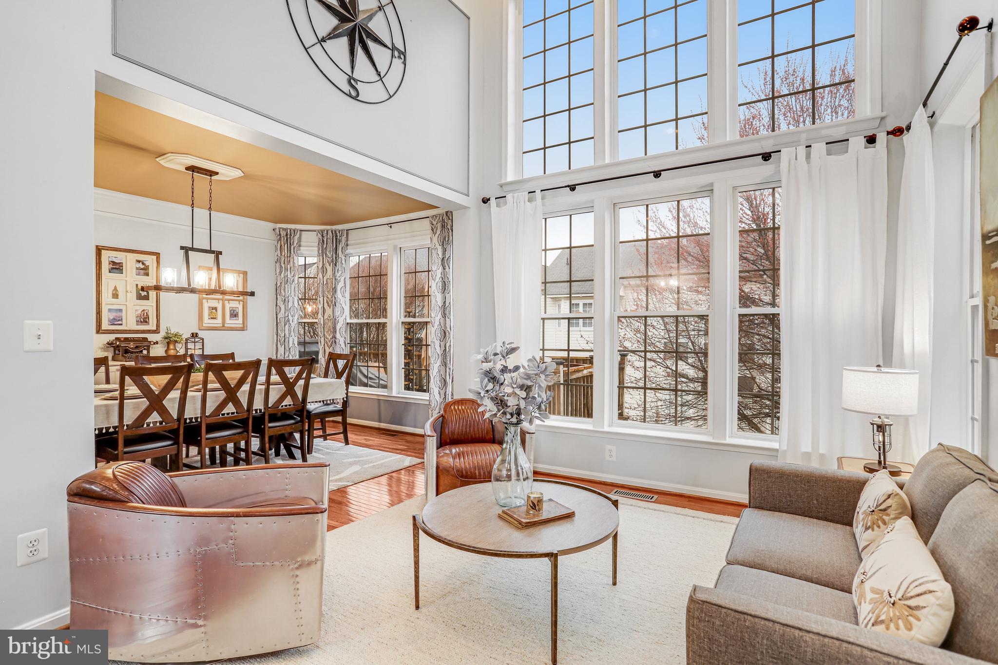 21625 Merion Street Ashburn, VA 20147 - Photo 31 of 80 a living room with furniture and a large window