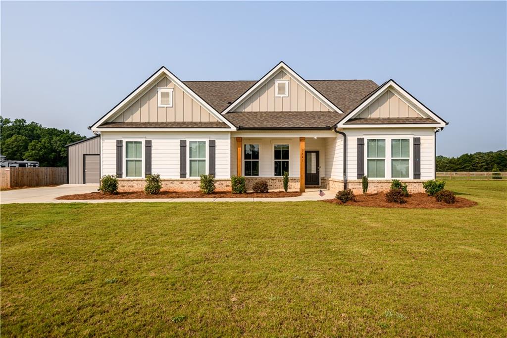 a front view of a house with swimming pool