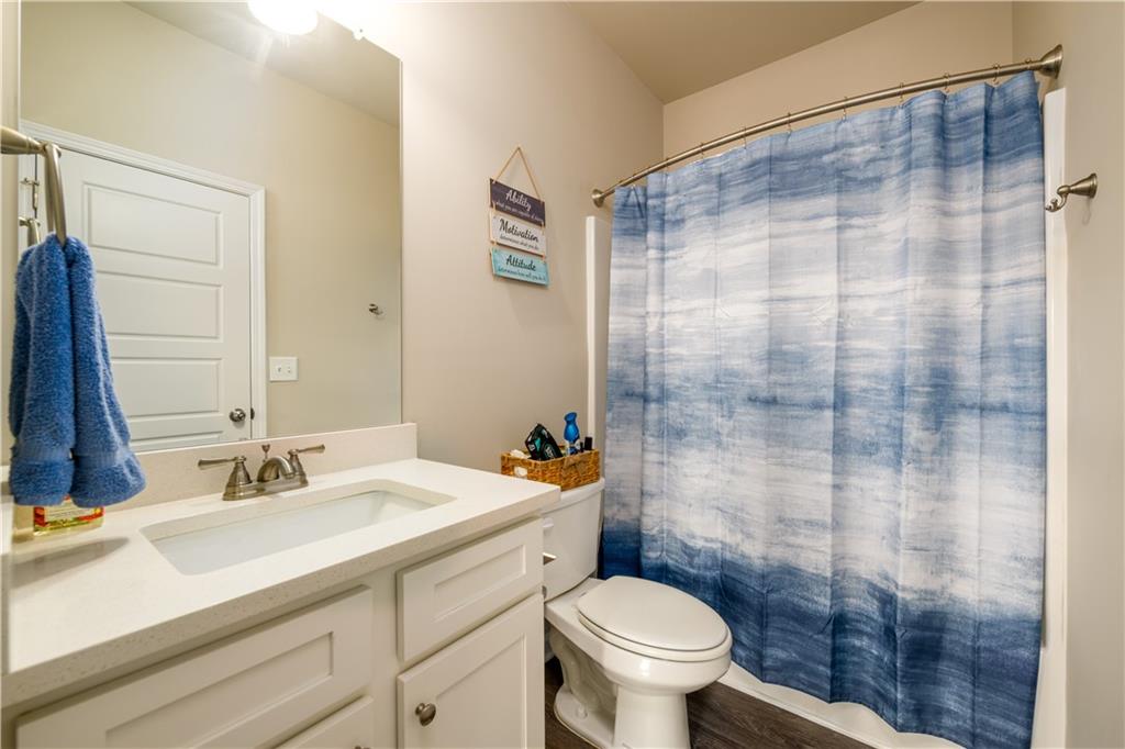 3741 Highway 83 Good Hope, GA 30641 - Photo 12 of 60 a bathroom with a sink a toilet and shower