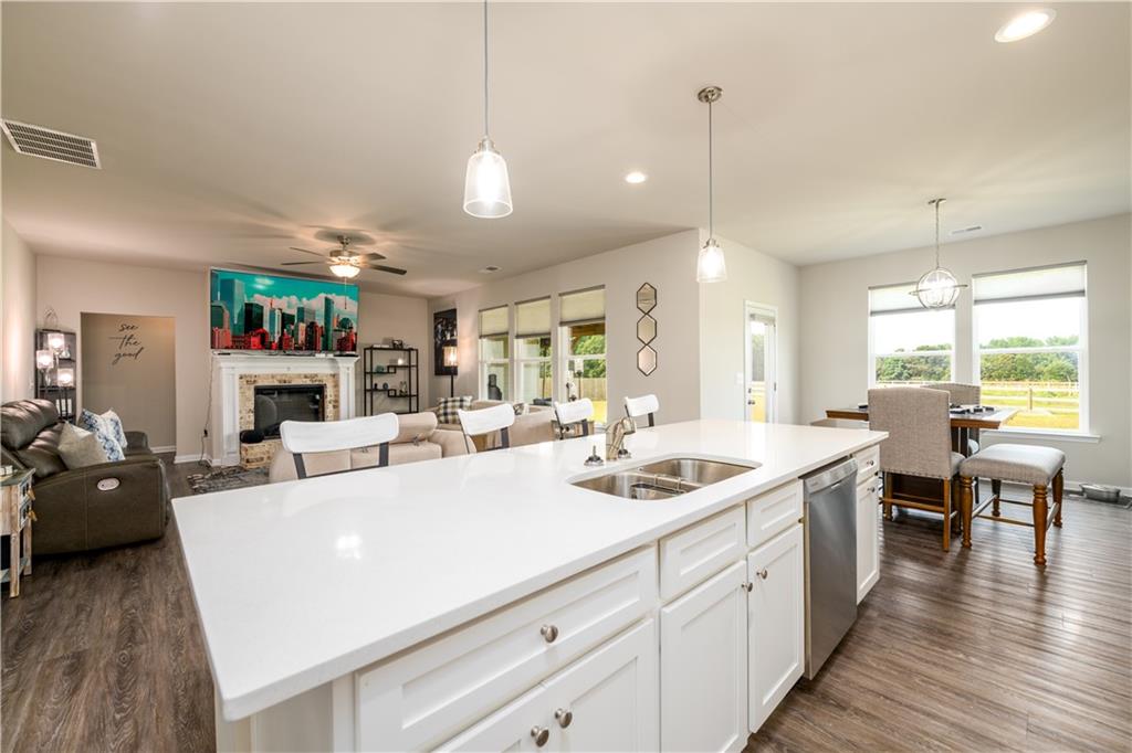 3741 Highway 83 Good Hope, GA 30641 - Photo 15 of 60 a view of a kitchen and dining room with wooden floor windows
