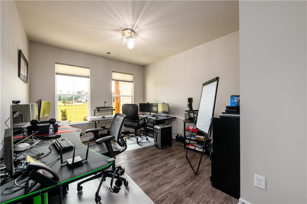 3741 Highway 83 Good Hope, GA 30641 - Photo 20 of 60 a living room with furniture and a flat screen tv