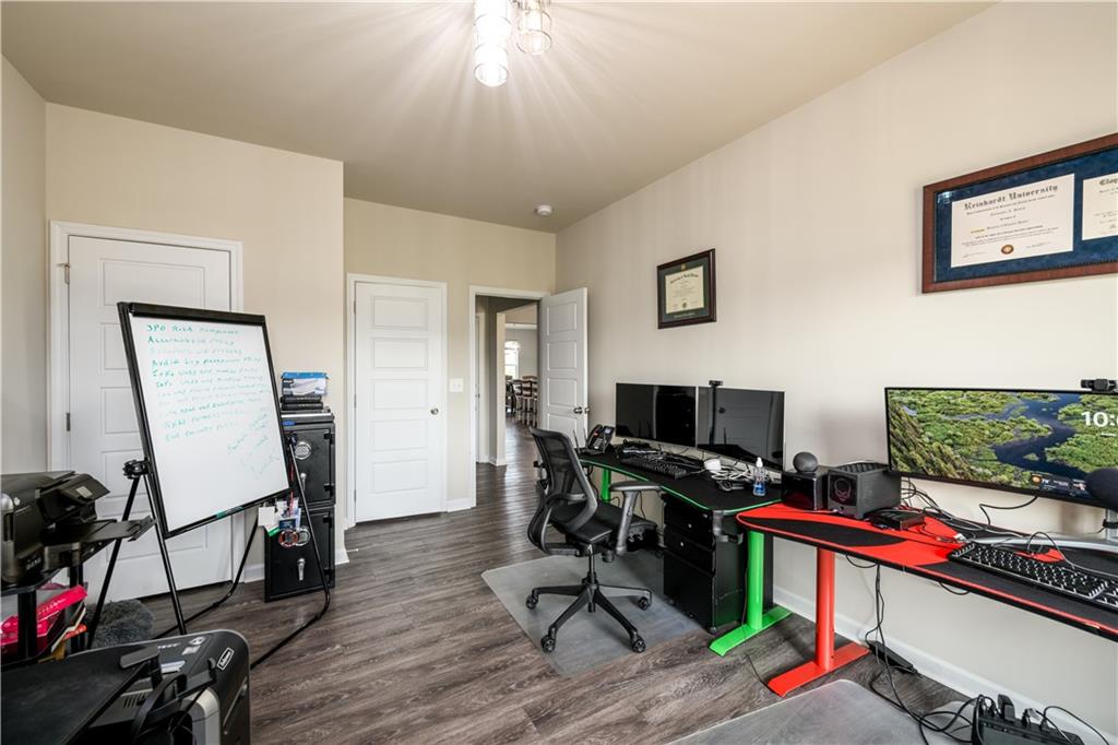 3741 Highway 83 Good Hope, GA 30641 - Photo 21 of 60 a view of a workspace with furniture and a livingroom